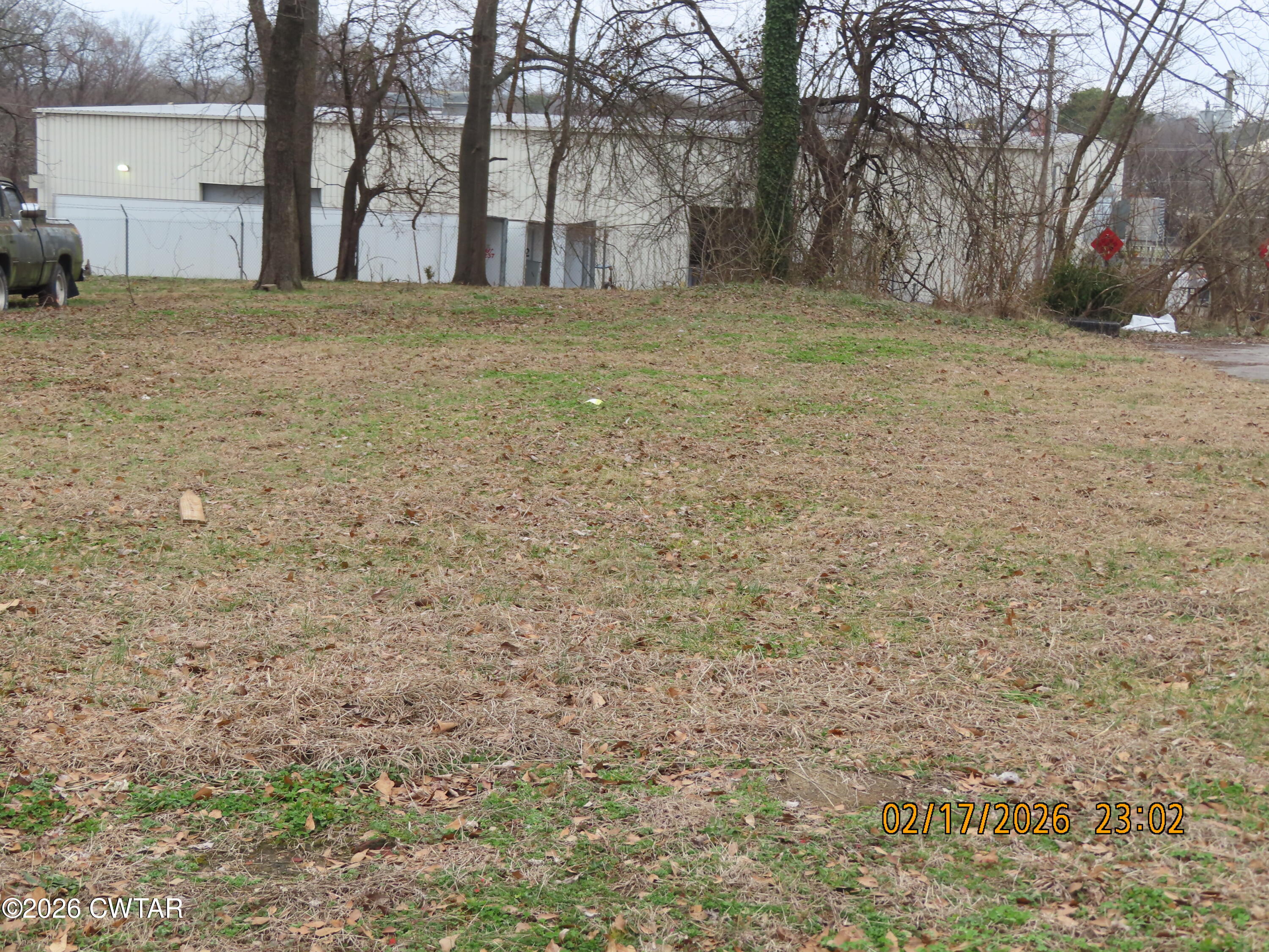243 Oak Street Jackson, TN 38301 - Photo 3 of 8 a view of outdoor space with garden