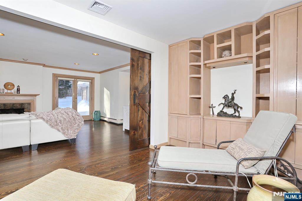 28 Bear Mountain Road Ringwood, NJ 07456 - Photo 12 of 50 a living room with furniture and wooden floor