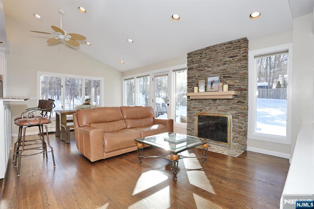28 Bear Mountain Road Ringwood, NJ 07456 - Photo 15 of 50 a living room with furniture and a fireplace
