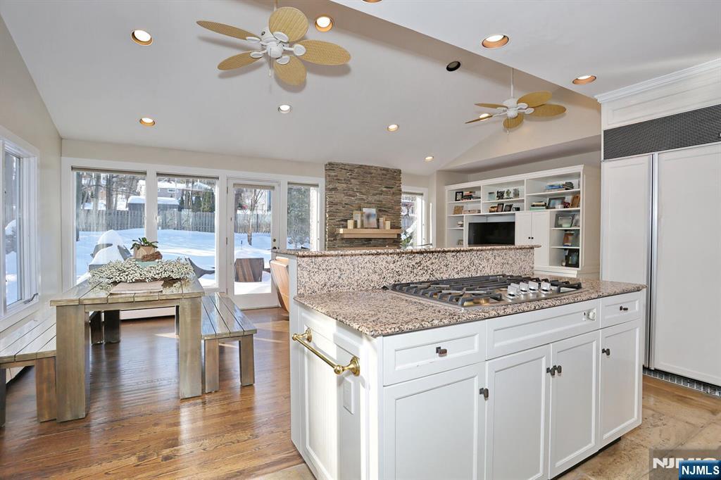 28 Bear Mountain Road Ringwood, NJ 07456 - Photo 21 of 50 a kitchen with stainless steel appliances granite countertop a stove and a refrigerator