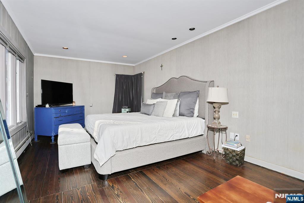 28 Bear Mountain Road Ringwood, NJ 07456 - Photo 27 of 50 a bed room with a bed tv and a window