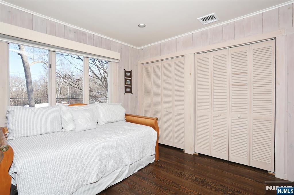 28 Bear Mountain Road Ringwood, NJ 07456 - Photo 33 of 50 a bedroom with a large bed and a large window