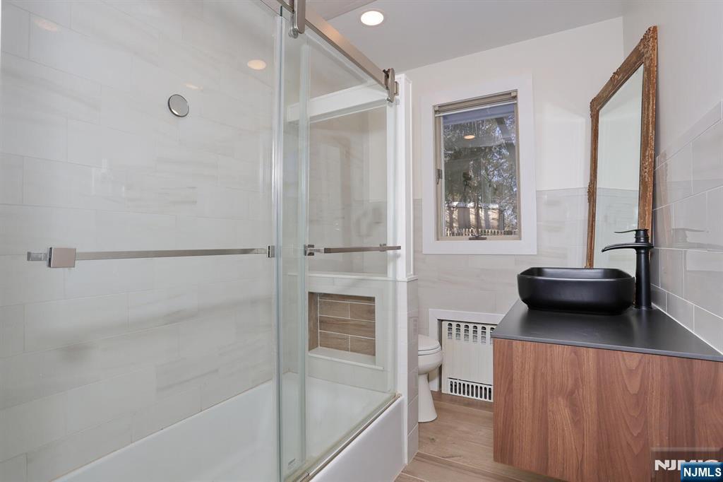 28 Bear Mountain Road Ringwood, NJ 07456 - Photo 35 of 50 a bathroom with a tub and a view of bathroom