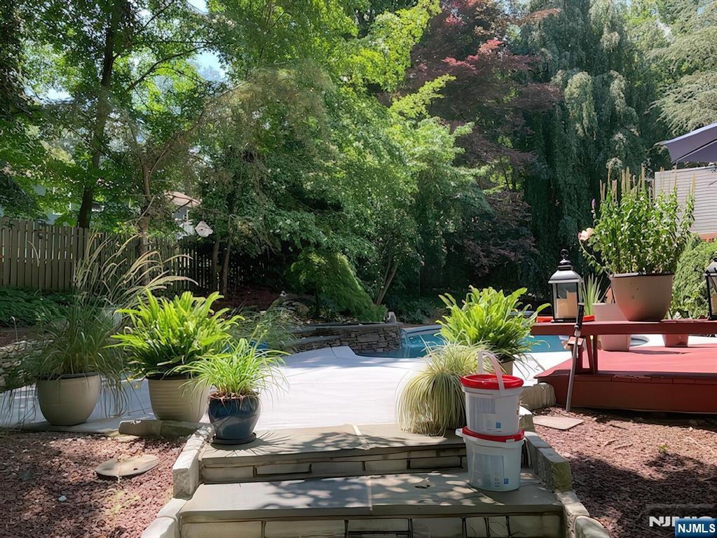 28 Bear Mountain Road Ringwood, NJ 07456 - Photo 47 of 50 a view of a backyard with chair the garden