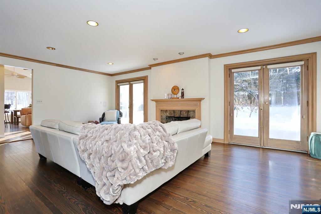28 Bear Mountain Road Ringwood, NJ 07456 - Photo 9 of 50 a living room with furniture and a fireplace