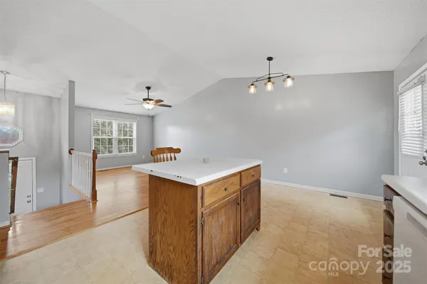 a view of a kitchen and a sink