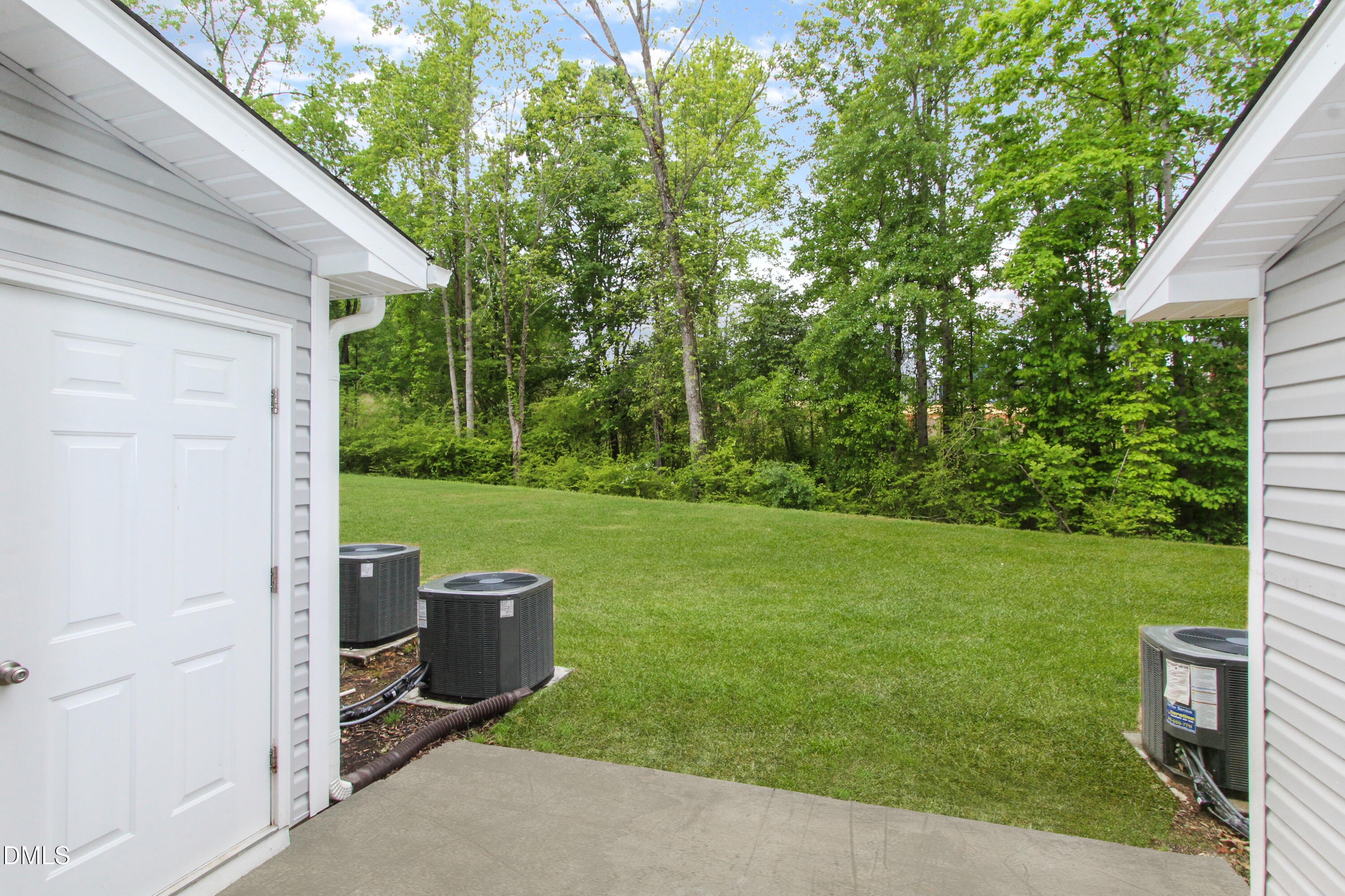 175 Carvins Cove Clayton, NC 27520 - Photo 3 of 10 a view of a backyard with a garden