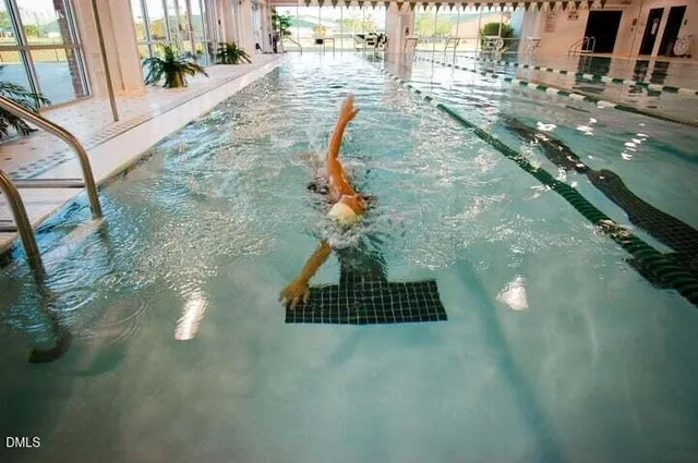 a vase of flowers sitting on a table