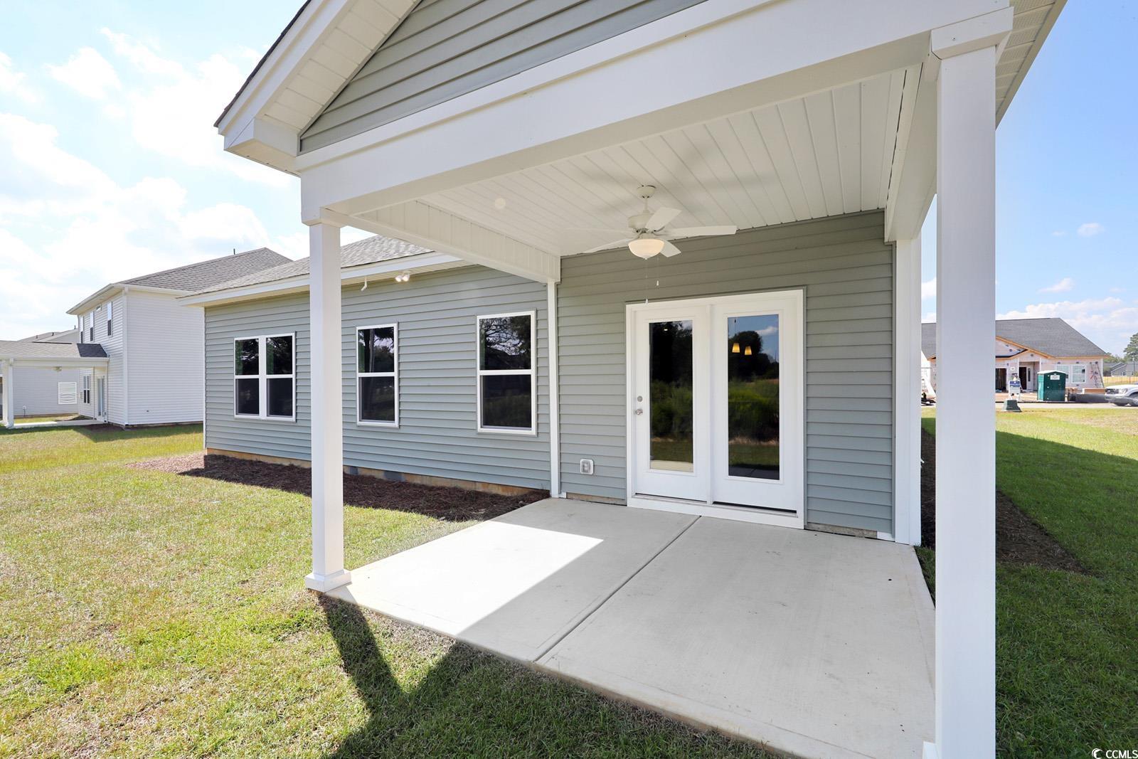331 Garden Grove Street Conway, SC 29526 - Photo 22 of 24 View of patio featuring a ceiling fan