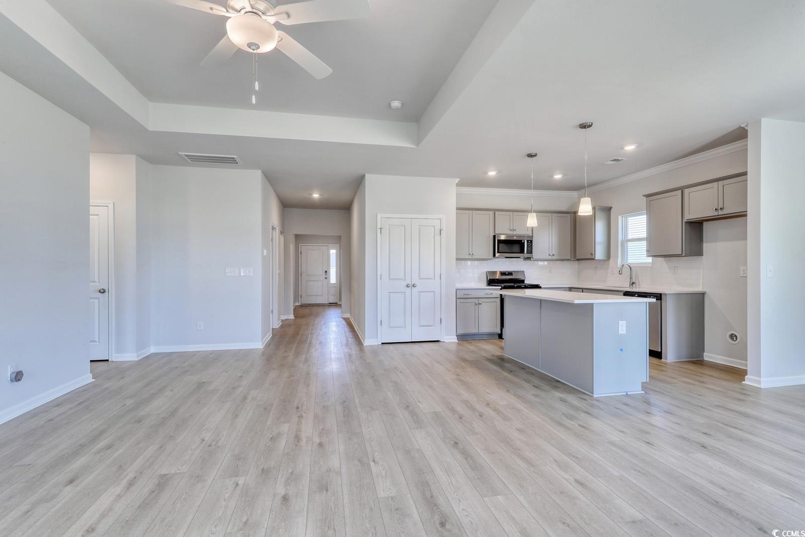331 Garden Grove Street Conway, SC 29526 - Photo 24 of 24 Kitchen with gray cabinets, open floor plan, light countertops, pendant lighting, and a center island