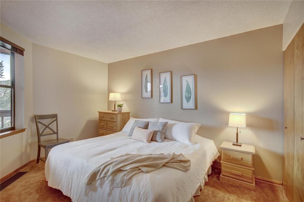 500 Bills Ranch Road, Unit 321 Frisco, CO 80443 - Photo 4 of 27 a bedroom with a bed and window