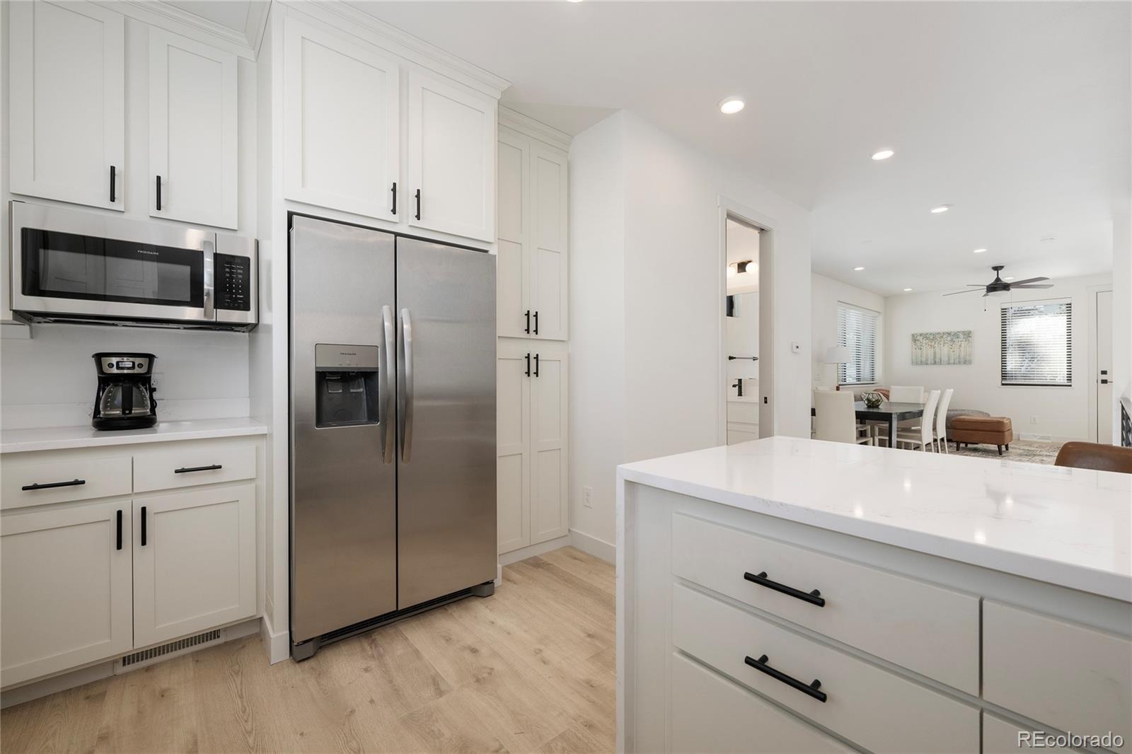 853 Ferret Lane Fraser, CO 80442 - Photo 12 of 32 a kitchen with kitchen island a sink stainless steel appliances and cabinets