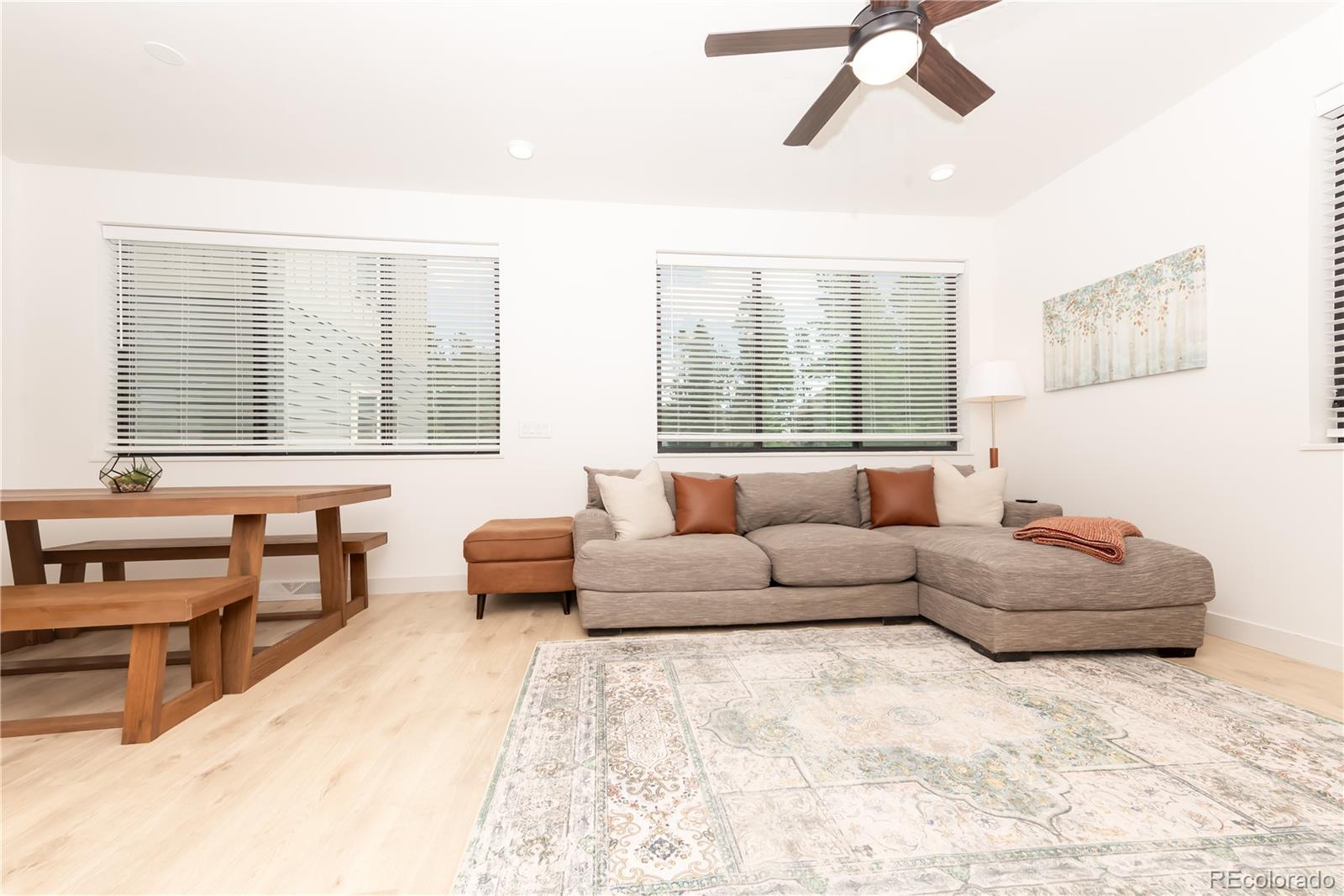 853 Ferret Lane Fraser, CO 80442 - Photo 4 of 32 a living room with furniture and windows
