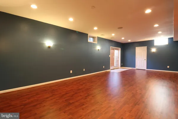a view of a livingroom with wooden floor