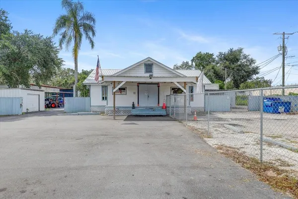 a front view of a house with a garage