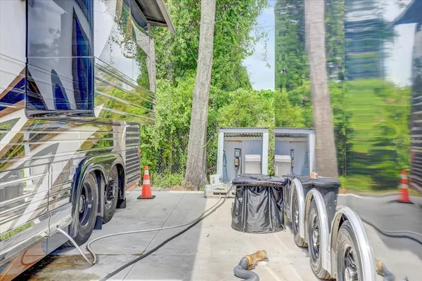 a view of a dining room with furniture and a table