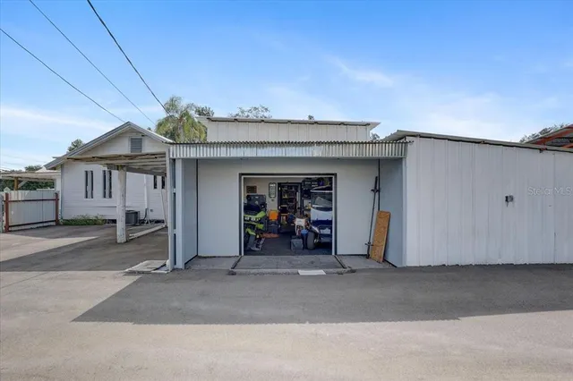a view of a dining room with furniture and a table
