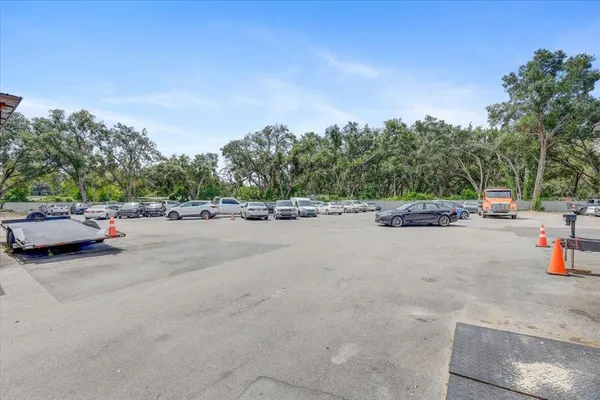 a view of a car park in front of house