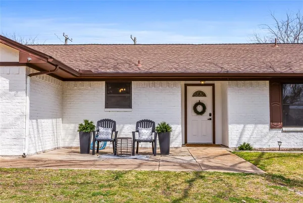 a view of swimming pool with outdoor seating