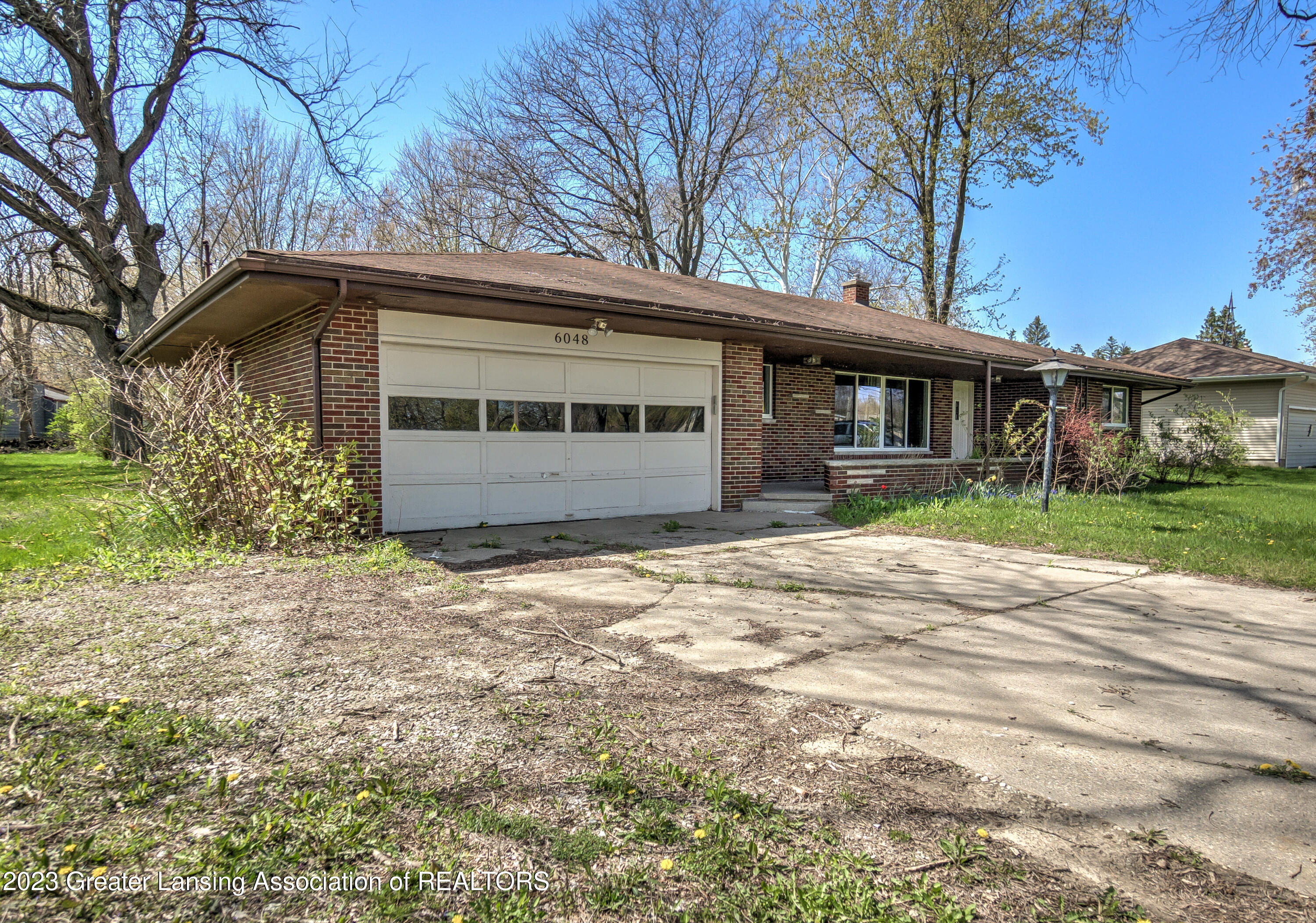 6048 South Waverly Road Lansing, MI 48911 - Photo 1 of 33 Front Exterior of Home