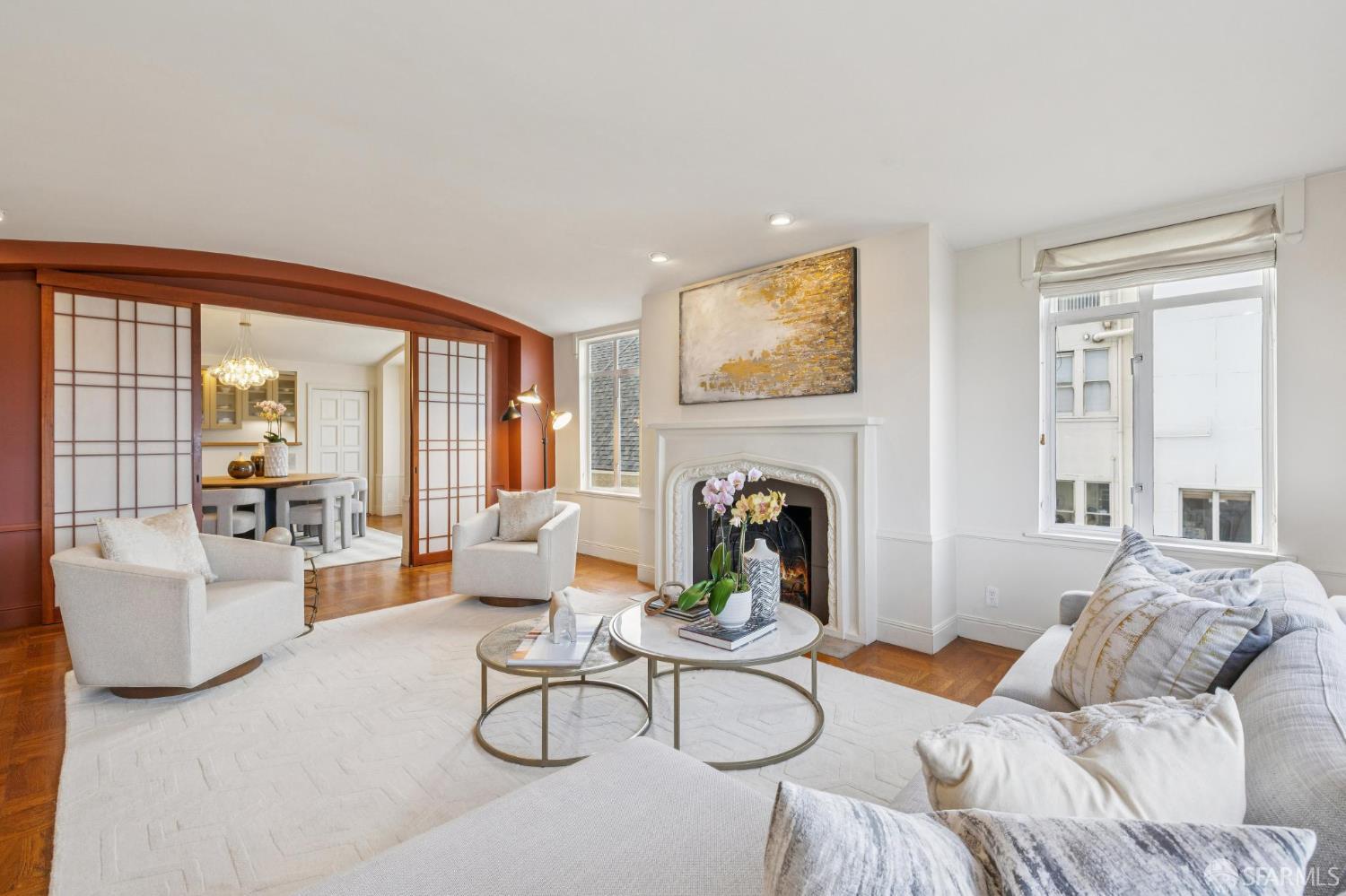 2100 Green Street, Unit 206 San Francisco, CA 94123 - Photo 1 of 33 a bedroom with furniture and a fireplace