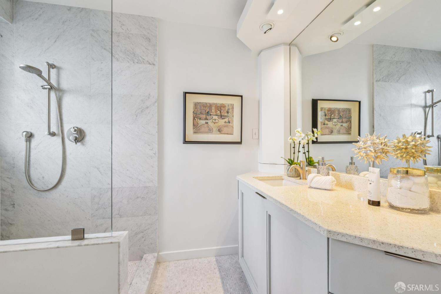 2100 Green Street, Unit 206 San Francisco, CA 94123 - Photo 21 of 33 a bathroom with a tub sink and mirror