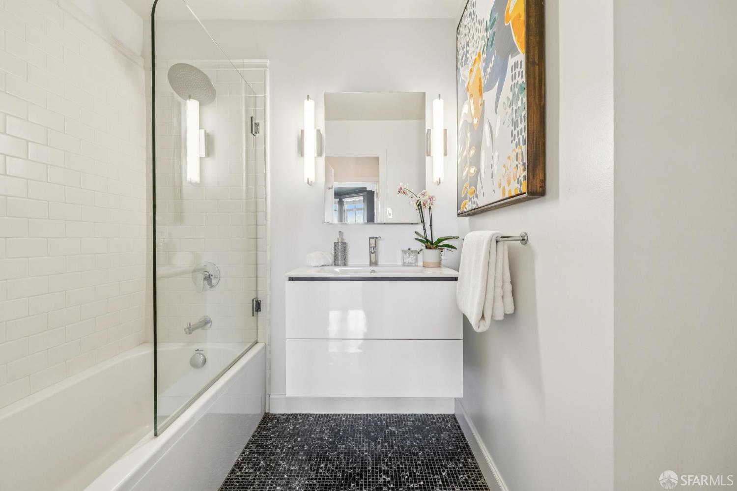 2100 Green Street, Unit 206 San Francisco, CA 94123 - Photo 27 of 33 a bathroom with a bathtub and a shower