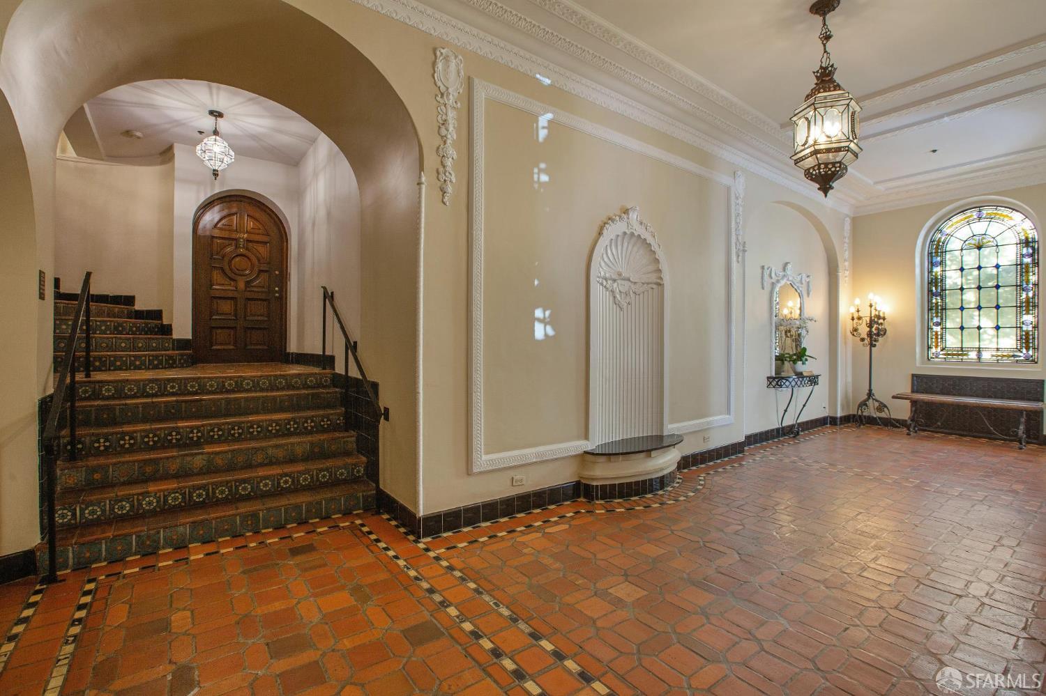 2100 Green Street, Unit 206 San Francisco, CA 94123 - Photo 29 of 33 a view of a entryway door with chandelier
