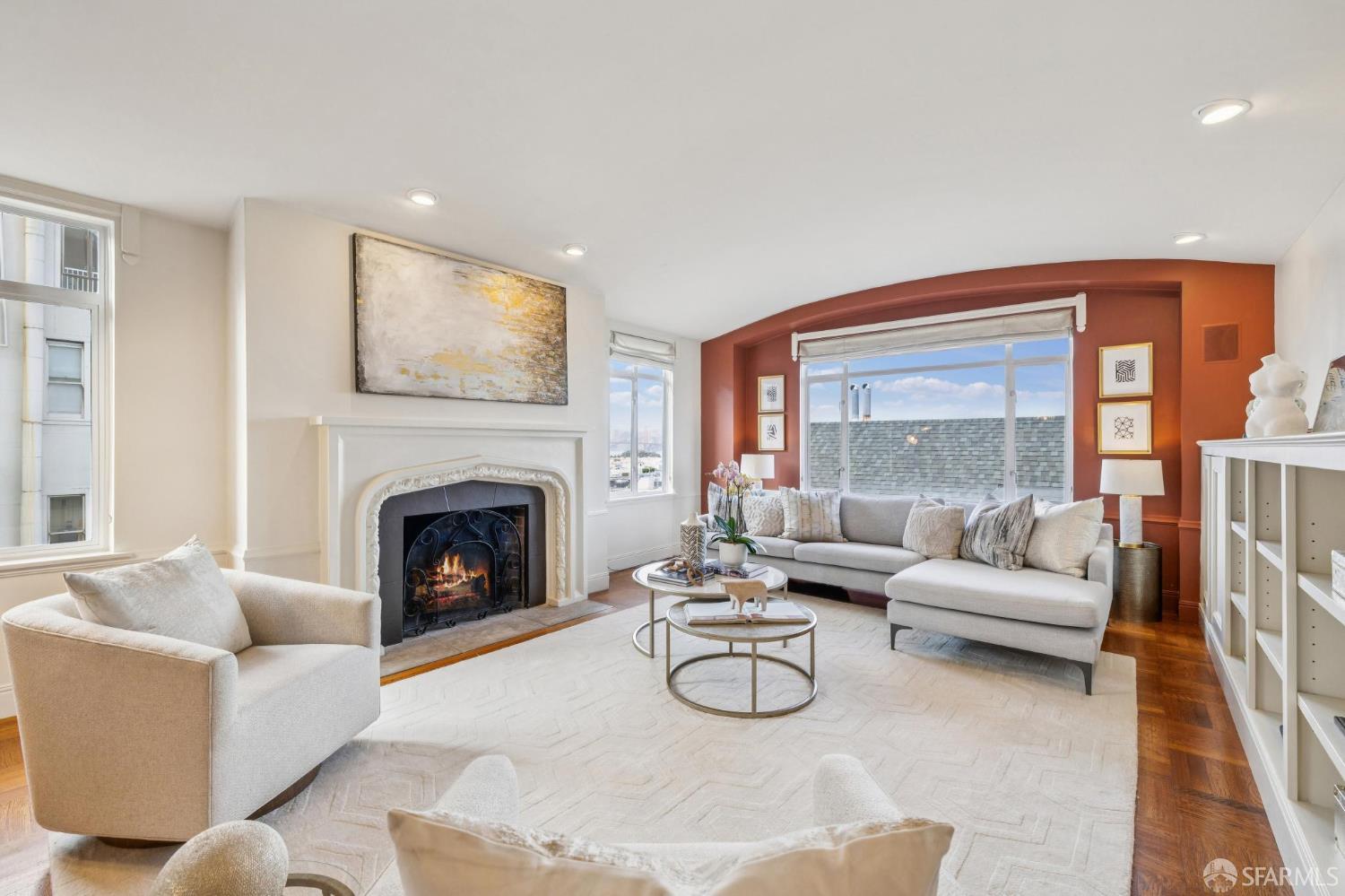 2100 Green Street, Unit 206 San Francisco, CA 94123 - Photo 5 of 33 a living room with furniture and a fireplace