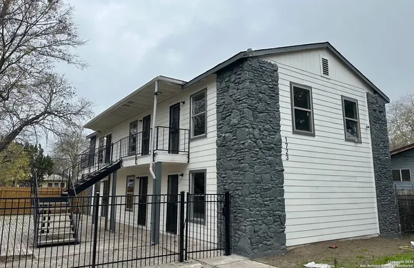 a front view of a house with a balcony