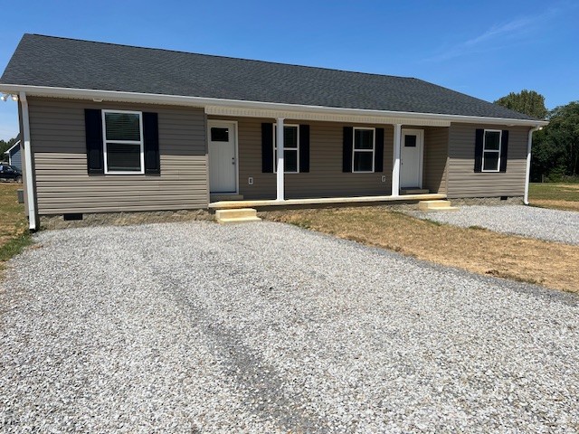 14 Cartertown Road, Unit B Scottsville, KY 42164 - Photo 1 of 15 a view of a house with a backyard and windows
