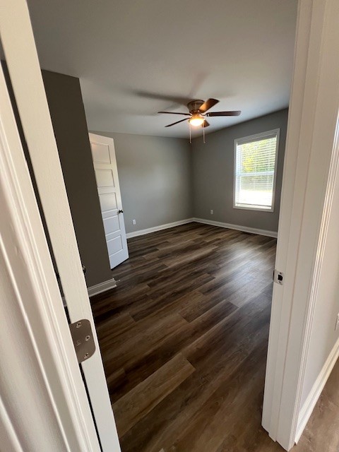 14 Cartertown Road, Unit B Scottsville, KY 42164 - Photo 5 of 15 a view of empty room with wooden floor and fan