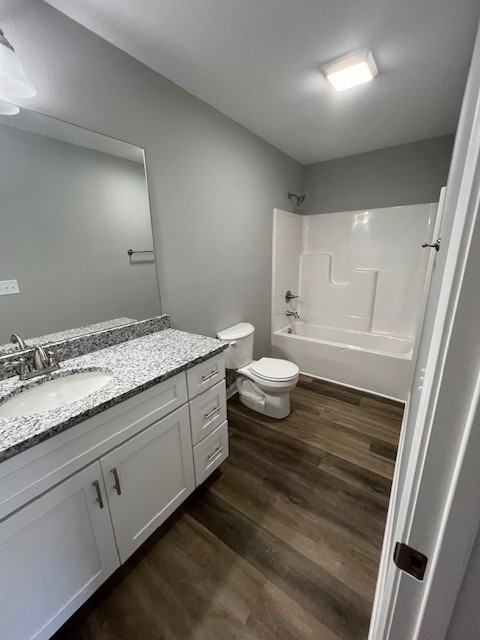 14 Cartertown Road, Unit B Scottsville, KY 42164 - Photo 7 of 15 a bathroom with a granite countertop sink and a mirror