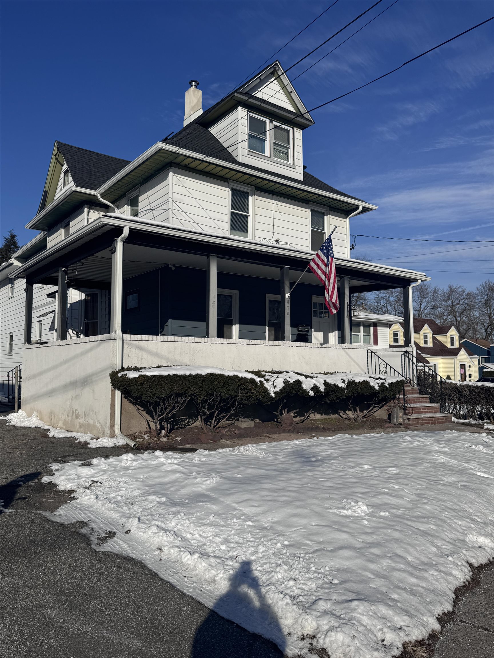 front view of a house with a big yard