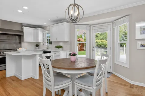 a kitchen with a stove and a refrigerator