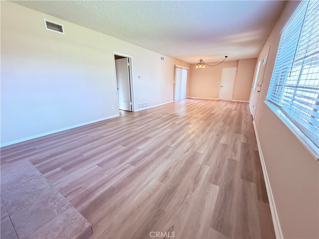14820 Ragan Drive La Mirada, CA 90638 - Photo 4 of 27 New Luxury Vinyl Plank Flooring throughout.