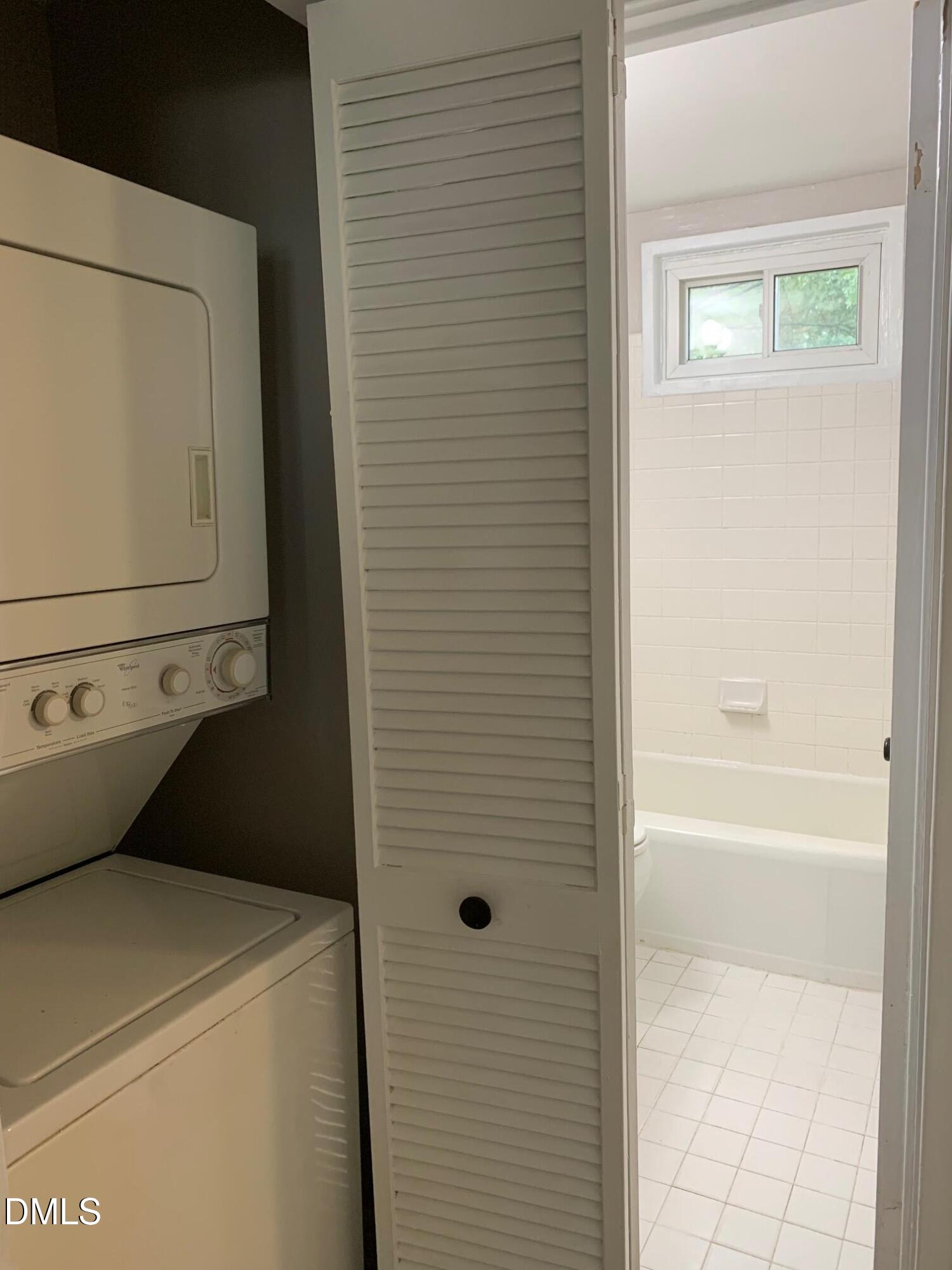 629 Daniels Street, Unit B Raleigh, NC 27605 - Photo 6 of 8 a utility room with dryer and washer