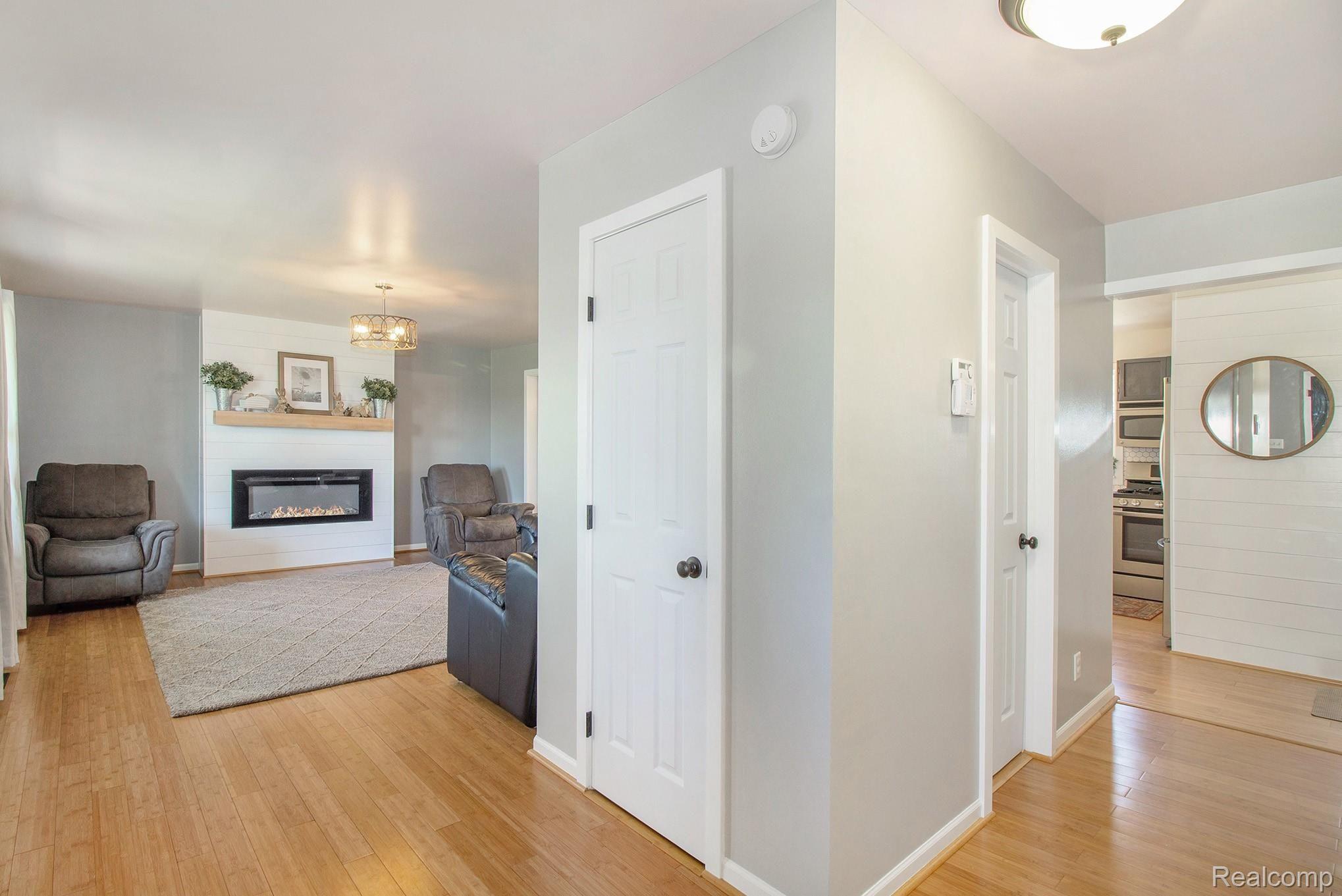 3235 South Bull Run Road Howell, MI 48843 - Photo 10 of 23 Front entry area. Bamboo floors throughout most of home.
