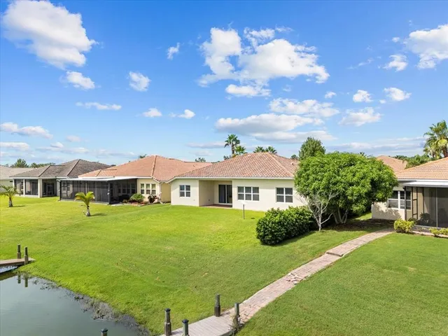 a view of a house with a big yard