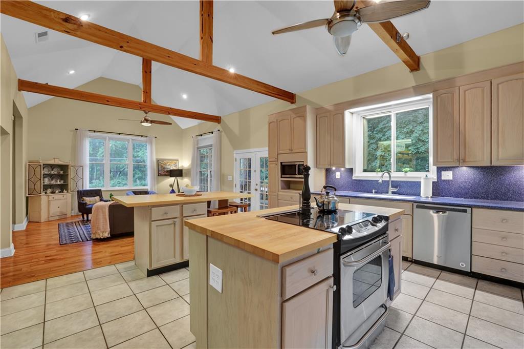 112 Myrtle Road Woodstock, GA 30189 - Photo 1 of 1 Celebrity Chef BOOS cutting block islands.
