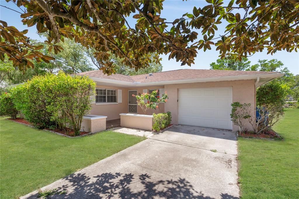 5063 Chamber Court Spring Hill, FL 34609 - Photo 1 of 1 a view of a house with a yard and sitting area