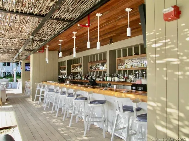 a view of a building with sitting area