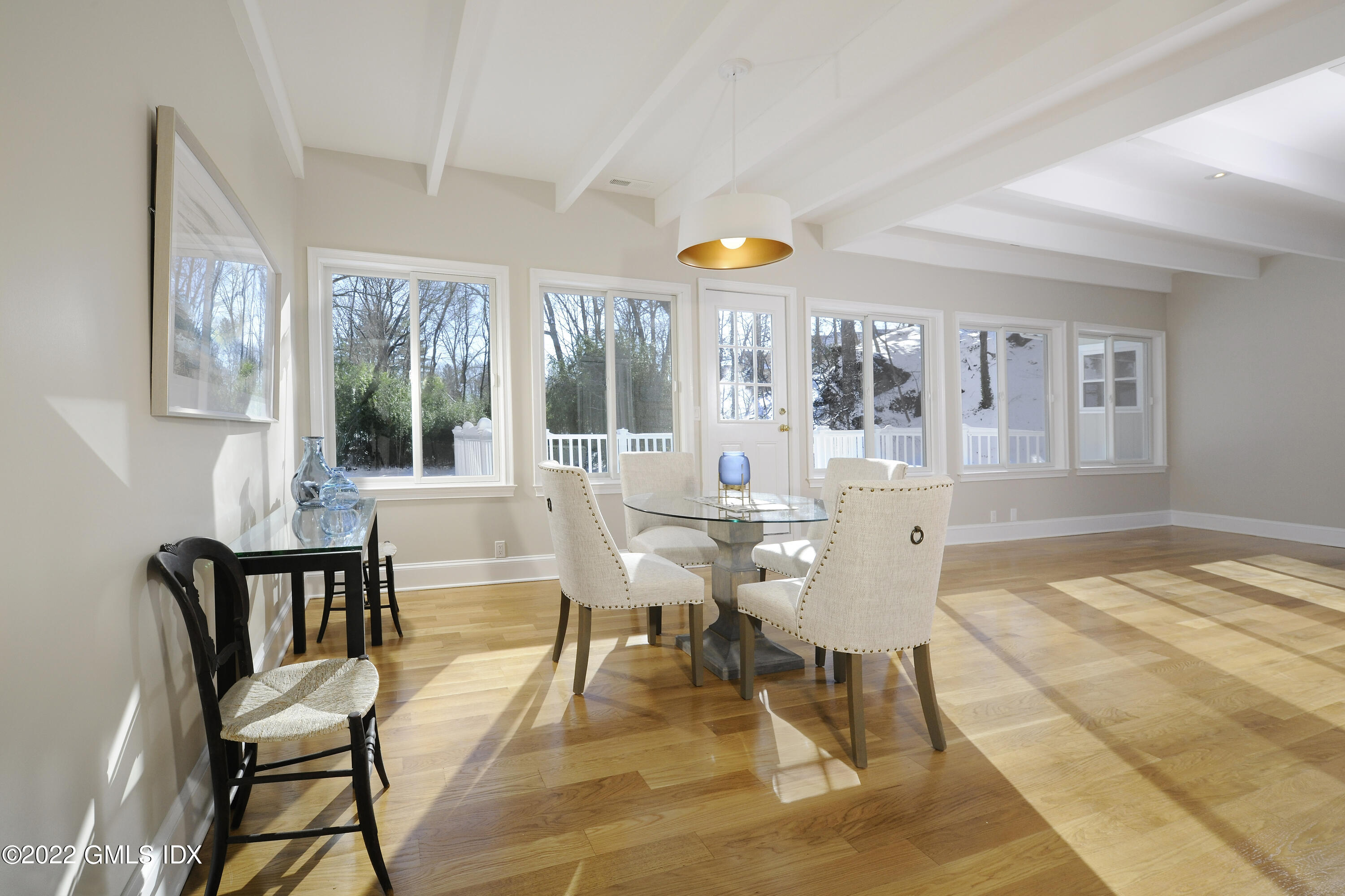 5 Anderson Road Greenwich, CT 06830 - Photo 11 of 31 a view of a dining room with furniture and chandelier