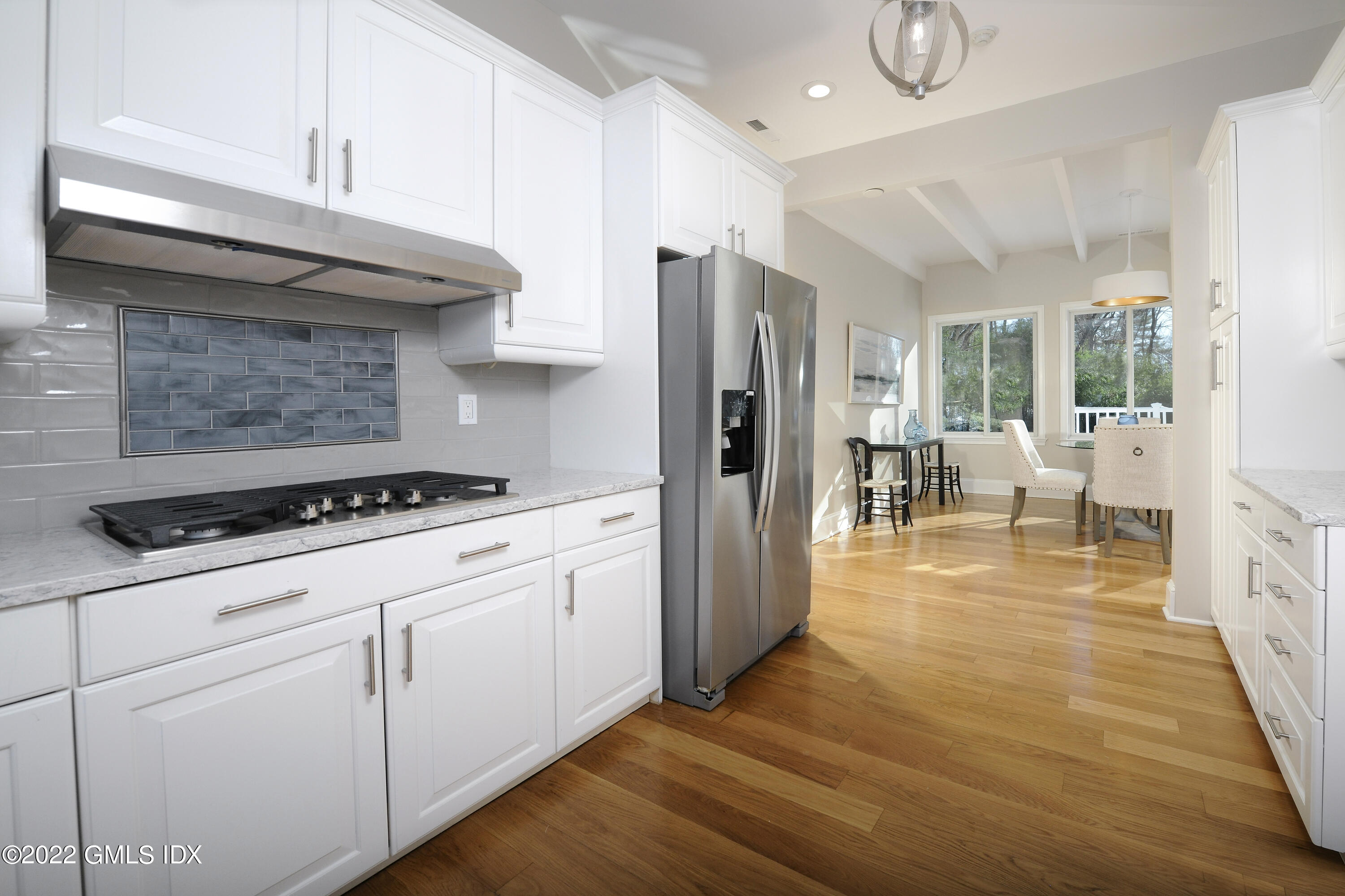 5 Anderson Road Greenwich, CT 06830 - Photo 13 of 31 a kitchen with a stove and a refrigerator