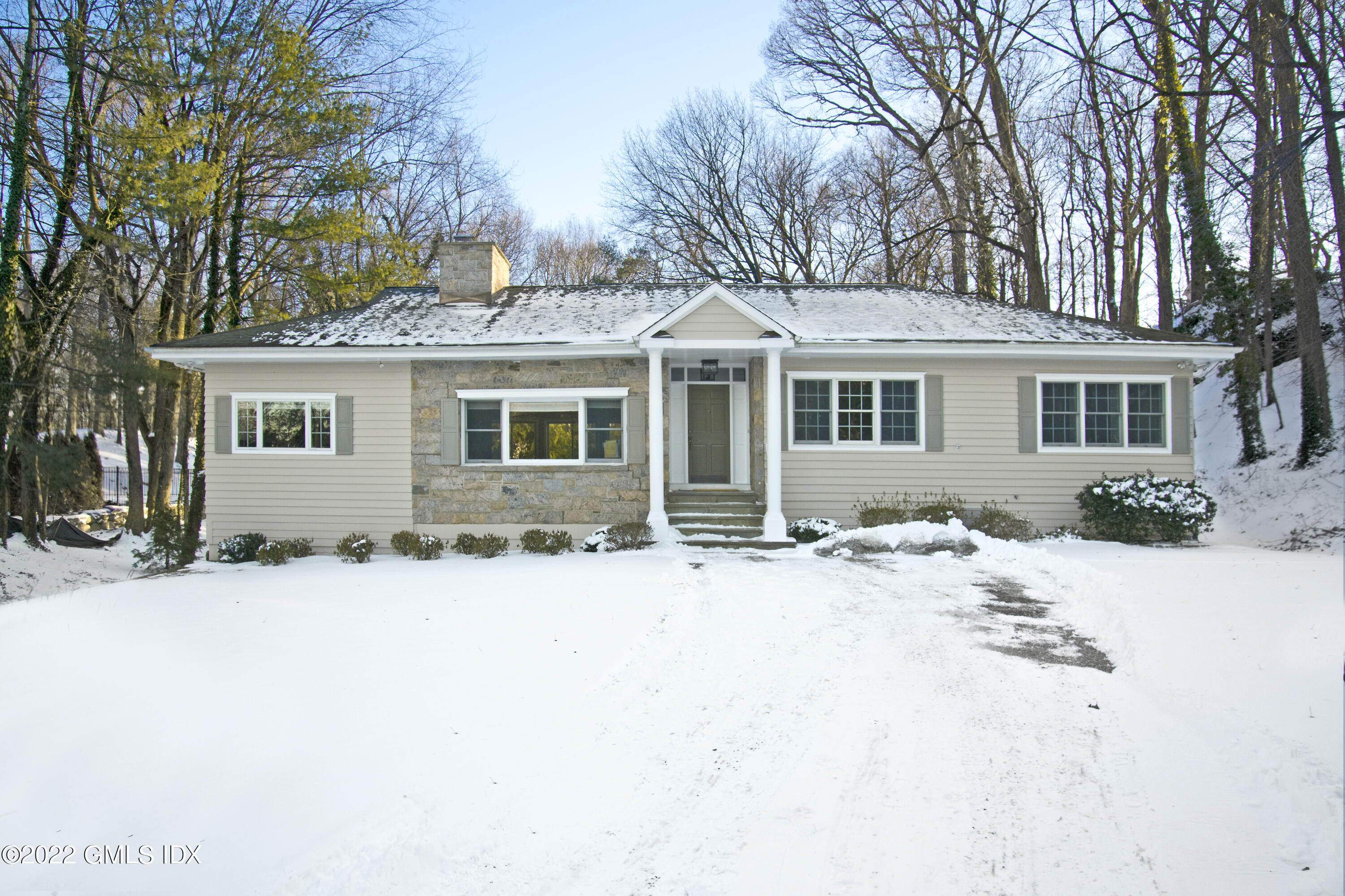 5 Anderson Road Greenwich, CT 06830 - Photo 2 of 31 front view of a house with a outdoor space