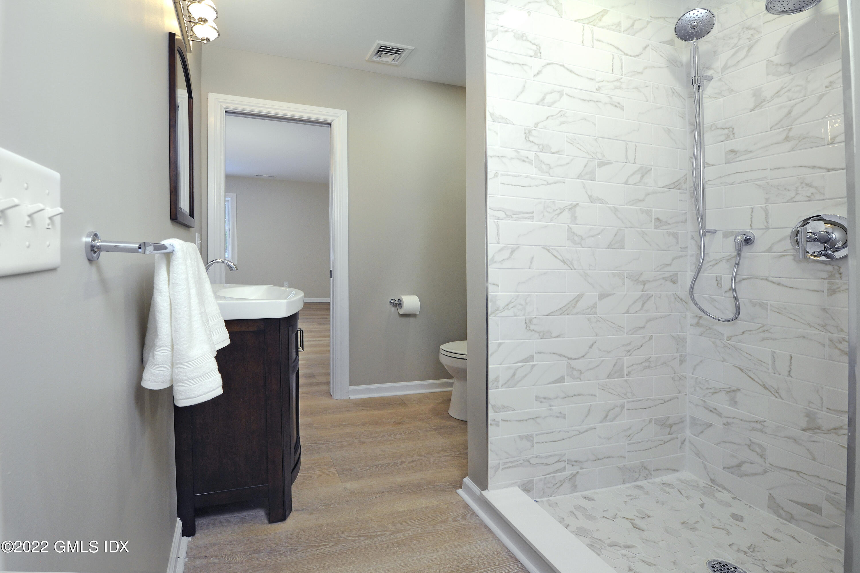 5 Anderson Road Greenwich, CT 06830 - Photo 26 of 31 a bathroom with a shower and a toilet