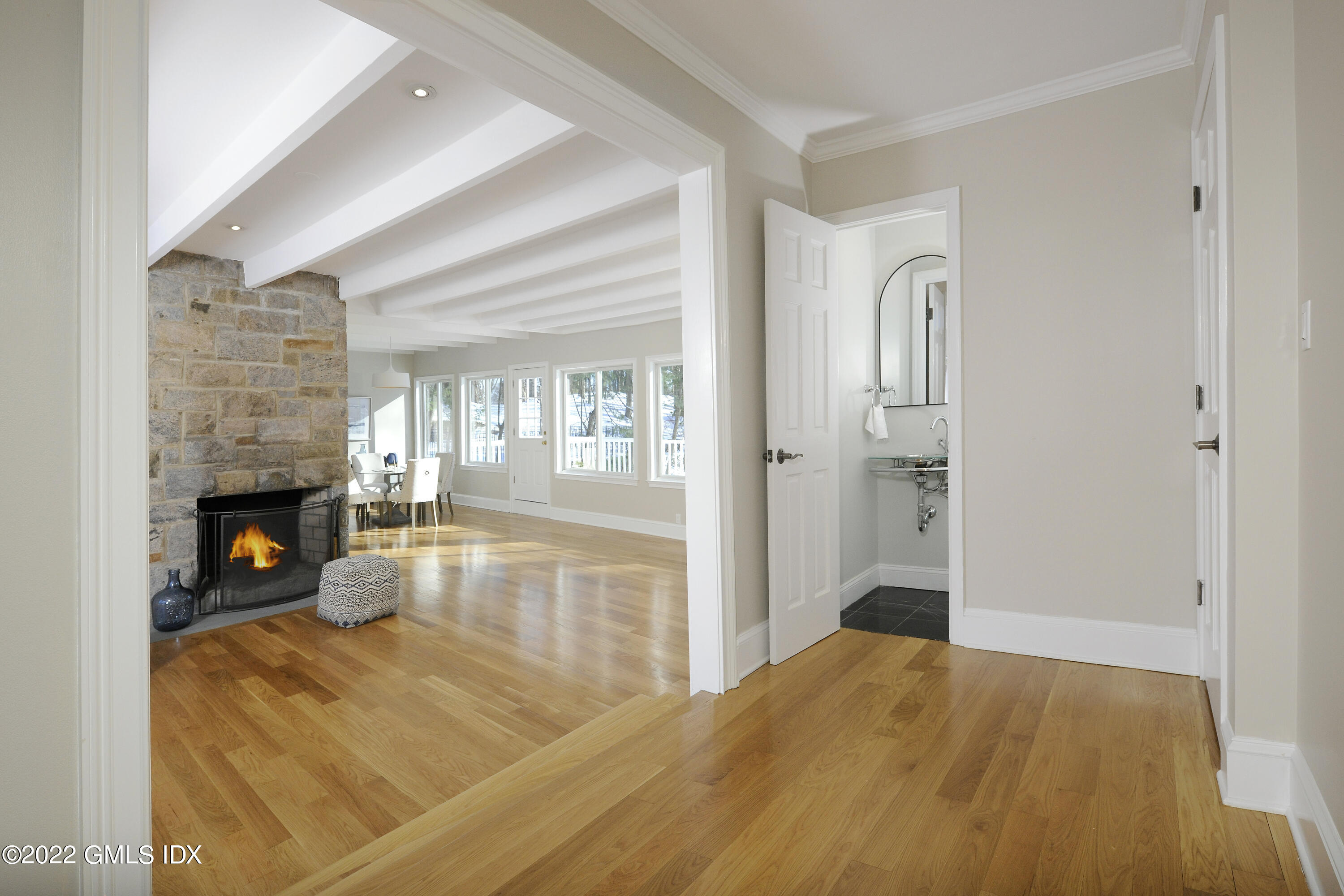 5 Anderson Road Greenwich, CT 06830 - Photo 6 of 31 a view of empty room with fireplace and wooden floor