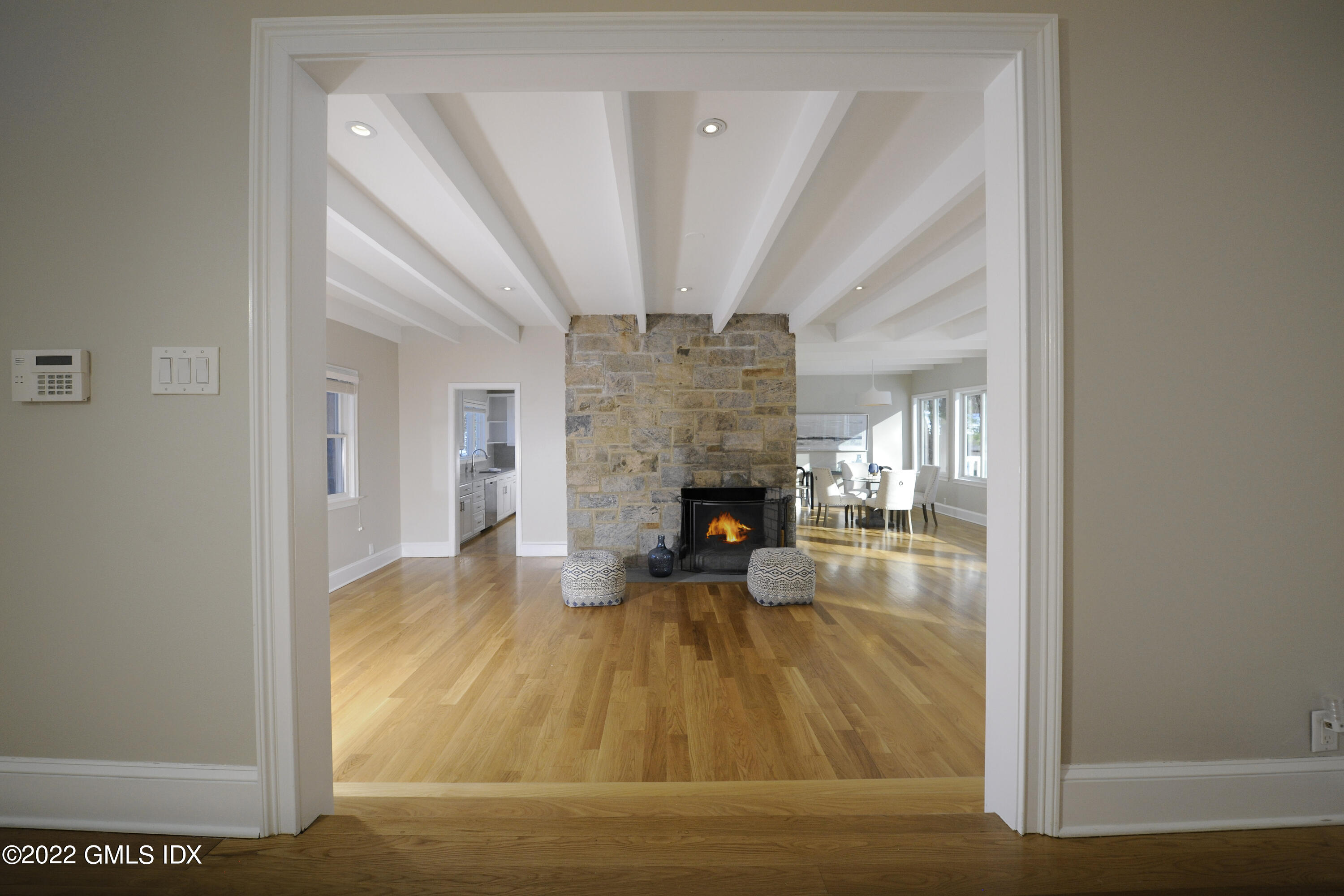 5 Anderson Road Greenwich, CT 06830 - Photo 7 of 31 a view of empty room with fireplace and wooden floor