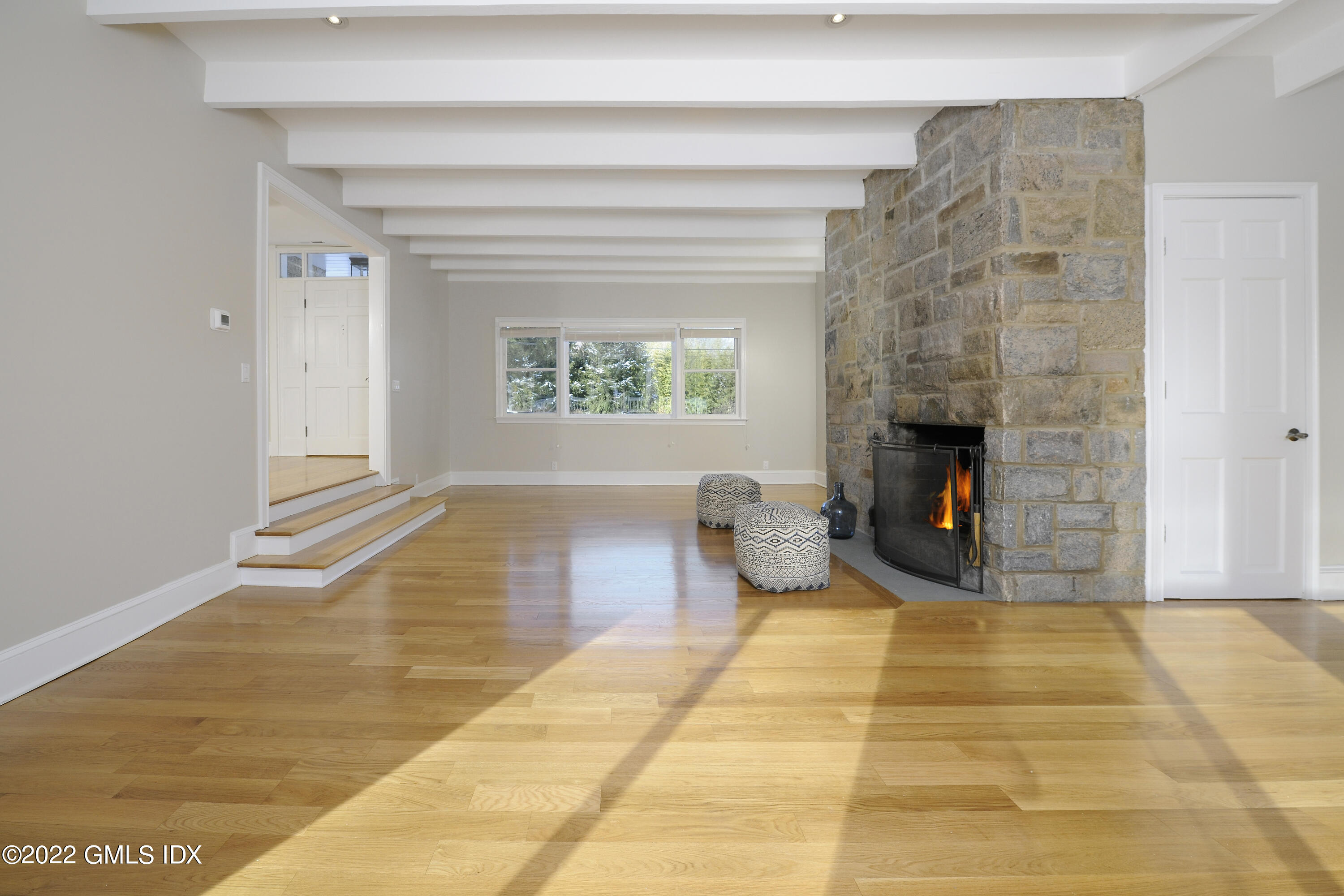 5 Anderson Road Greenwich, CT 06830 - Photo 9 of 31 a view of empty room with furniture and a fireplace