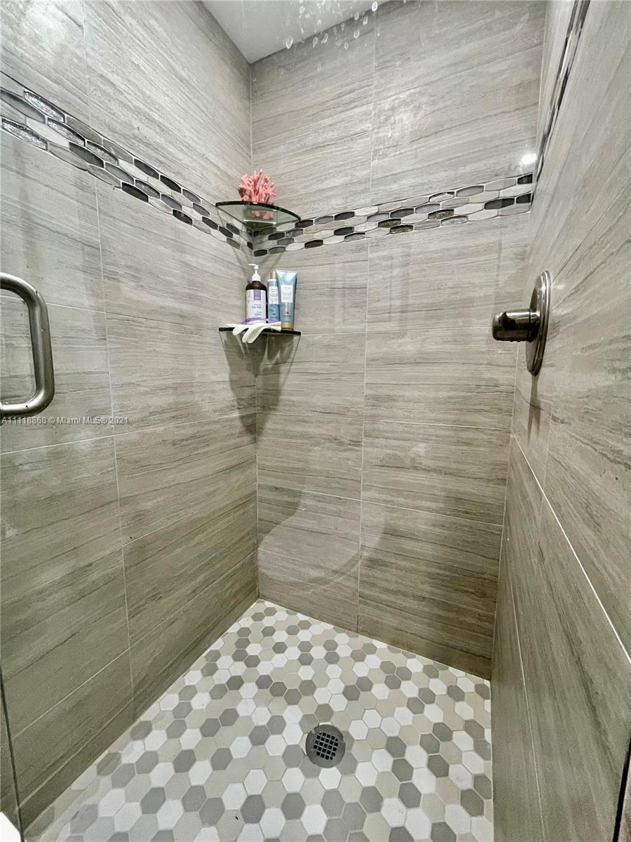 Kings Point Piedmont Delray Beach, FL 33484 - Photo 20 of 22 a bathroom with a shower